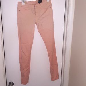 Peach skinny leg Club Monaco stretchy jeans.